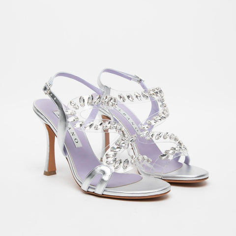 WOMEN'S SILVER SANDAL IN PLEXIGLASS WITH STONES.